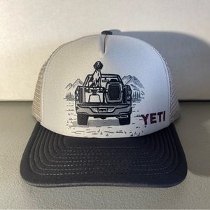 Yeti Pup in a Truck Trucker Hat